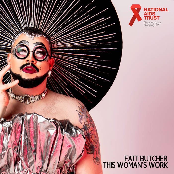 A person wearing glasses, drag make up, a beard, a large black and silver hat and a silver corset type dress looks directly at camera. To their right is a National AIDs Trust logo, and the words 'Fatt Butcher. This Woman's Work'.